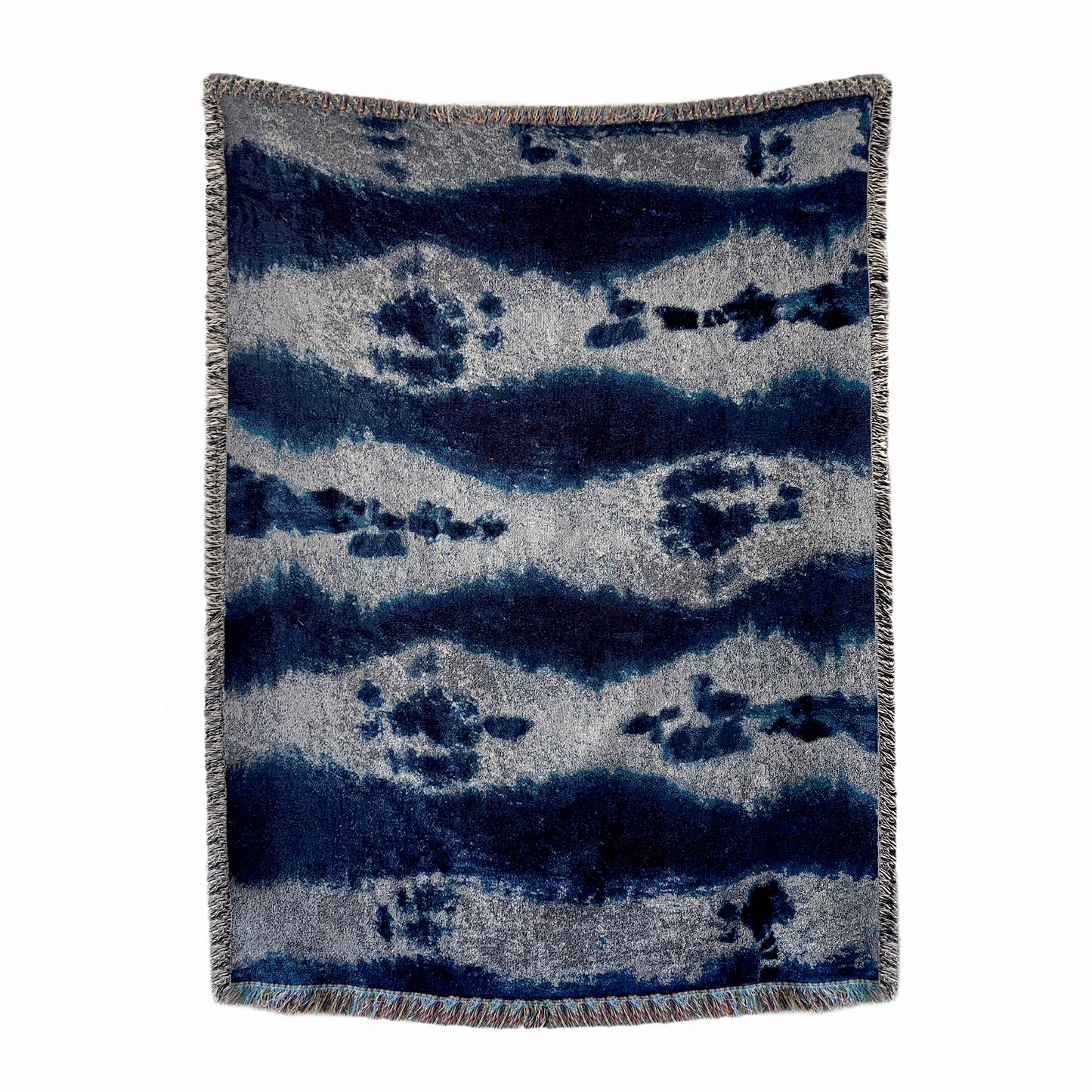 Silver gray and indigo blue woven cotton throw blanket with fringed edges, in abstract Inkblot pattern. 54 by 72 inches.