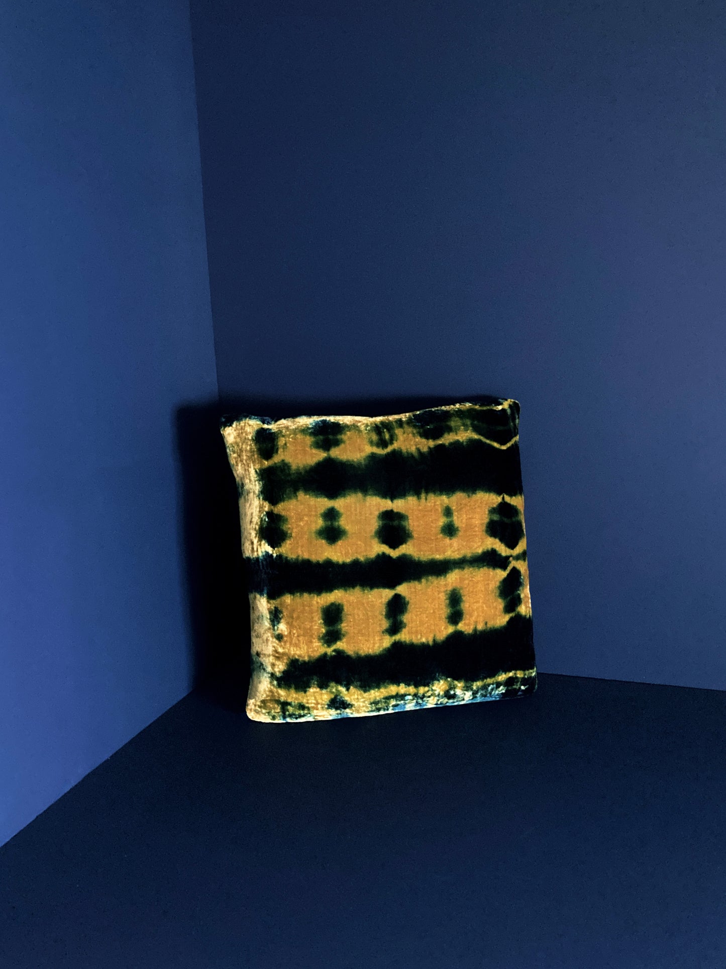 Gold yellow velvet throw pillow dyed with blue indigo in Pleat pattern with gray linen backing. Sustainably hand dyed in small batches and sewn in New York City,