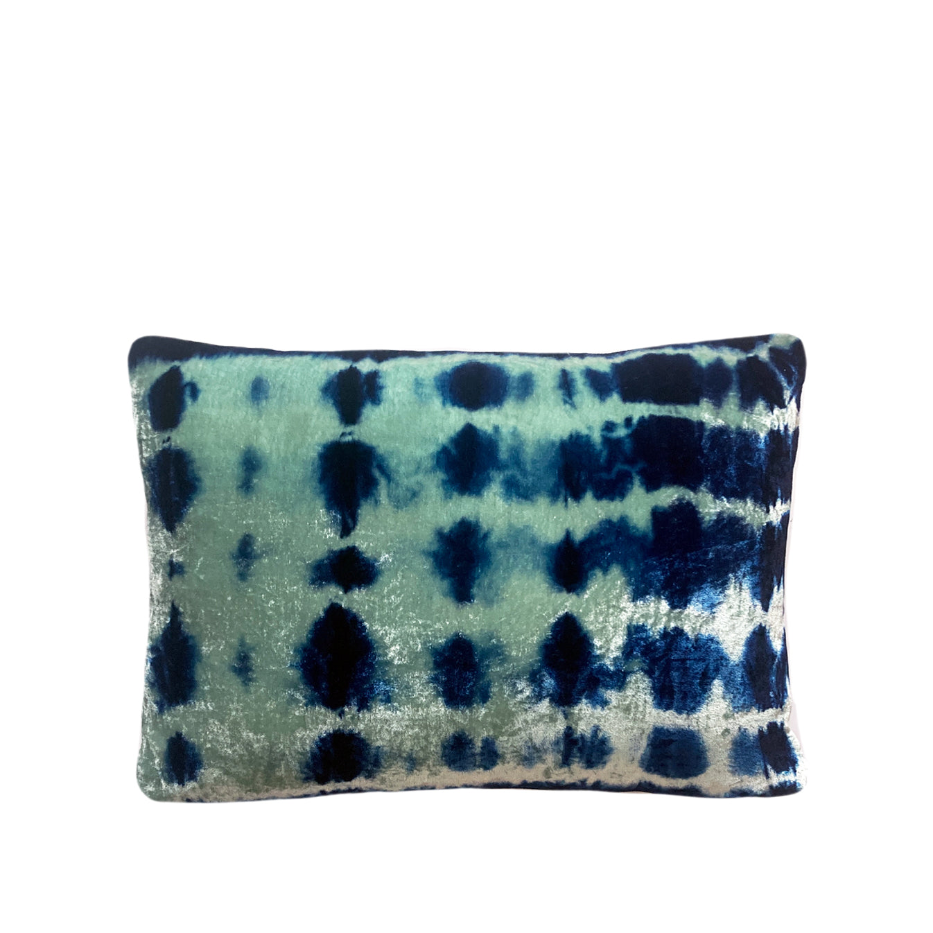 Jade green velvet throw pillow dyed with blue indigo in Inkblot pattern with gray linen backing. Sustainably hand dyed in small batches and sewn in New York City,