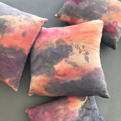 Grouping of rose pink silk pillows in abstract patterns. Hand painted.