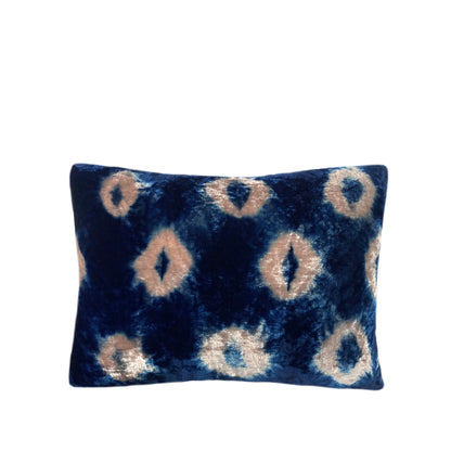 Rose pink velvet throw pillow dyed with blue indigo in Ikat pattern with gray linen backing. Sustainably hand dyed in small batches and sewn in New York City,