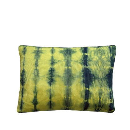 Canary yellow silk pillow dyed with indigo, in abstract ripple pattern.